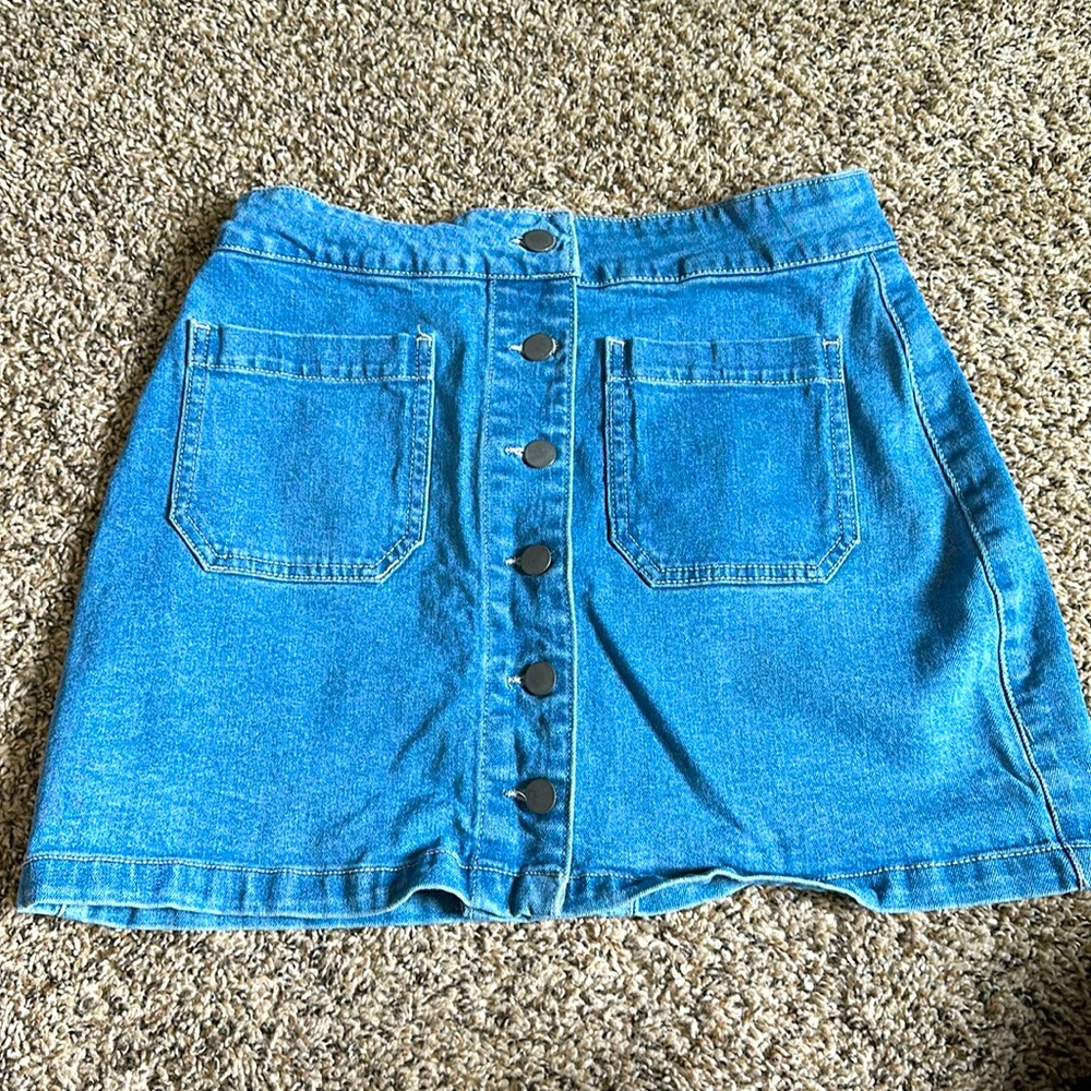 Jean Mini Skirt. Stretchy. Size medium.